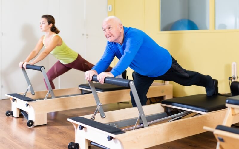 Accredited NDIS exercise physiologist in Parramatta helping an older adult improve mobility using the Pilates reformer. Tailored Exercise Physiology supports NDIS goals with individual programs across Western Sydney. Accredited NDIS exercise physiologist in Parramatta helping an older adult improve mobility using the Pilates reformer. Tailored Exercise Physiology supports NDIS goals with individual programs across Western Sydney.